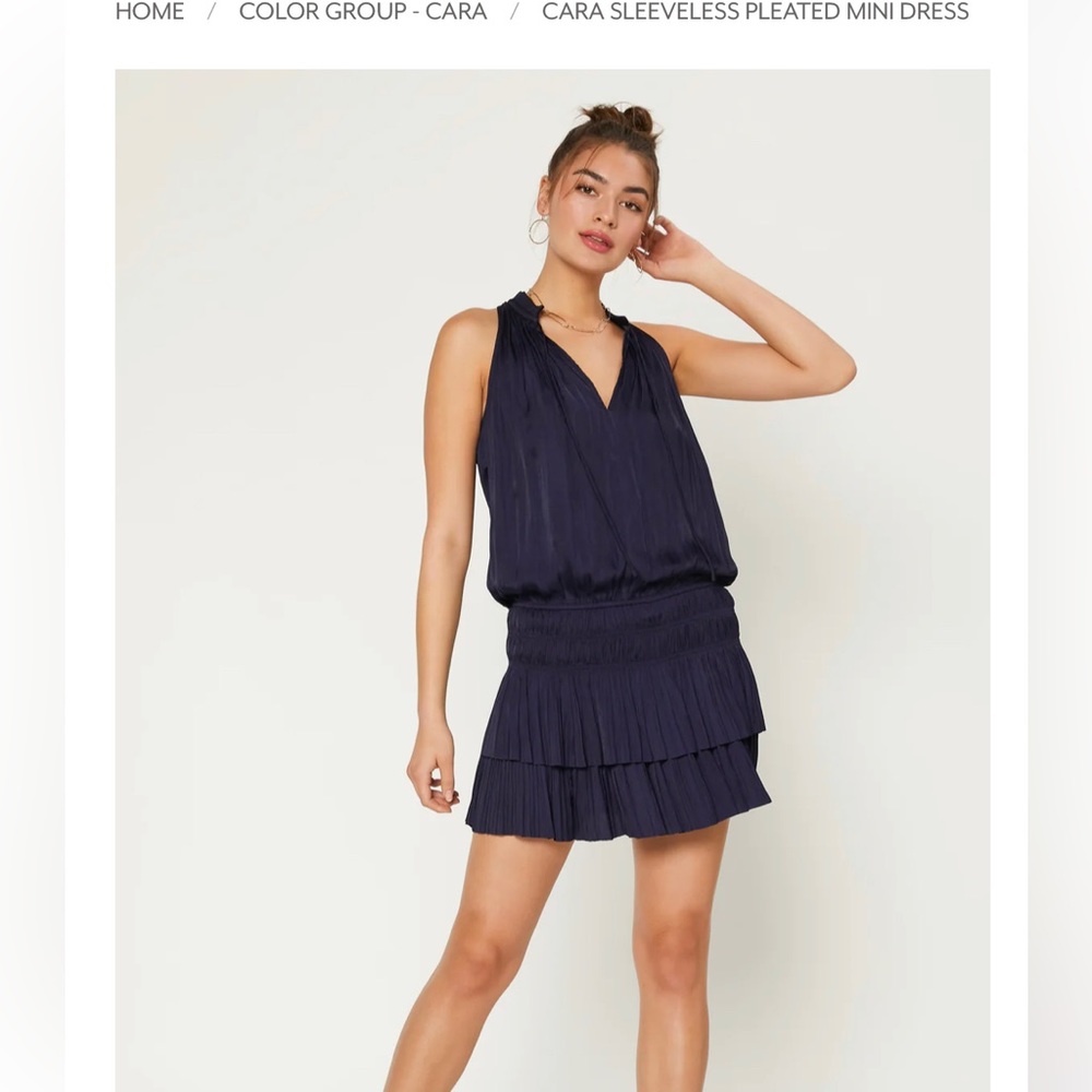 Silk mini dress with tags. The brand is Current Air and the color is navy.